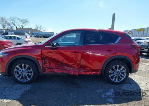 2021 Mazda Cx-5 Grand Touring z USA, uszkodzony, nr VIN JM3KFBDM6M0453696